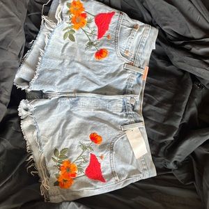 Embroidered Levi’s cutoff shorts